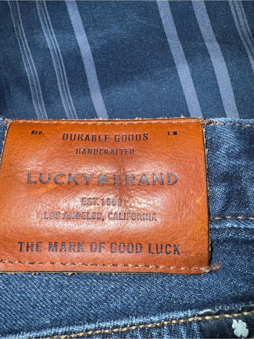 Lucky Brand Men’s Blue Denim Jeans with Brown Leather Patch
